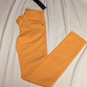 Orange stretchy skinny jeans